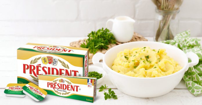 2 President India chiplets salted butter with 100g and 500g salted butter. Mashed potatos in the background.
