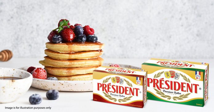 President India salted and unsalted butter with stack of pancakes