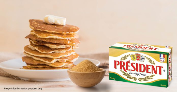 President India butter with stack of pancakes